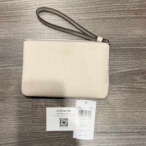 Coach Ivory Wristlet with Gold Accents